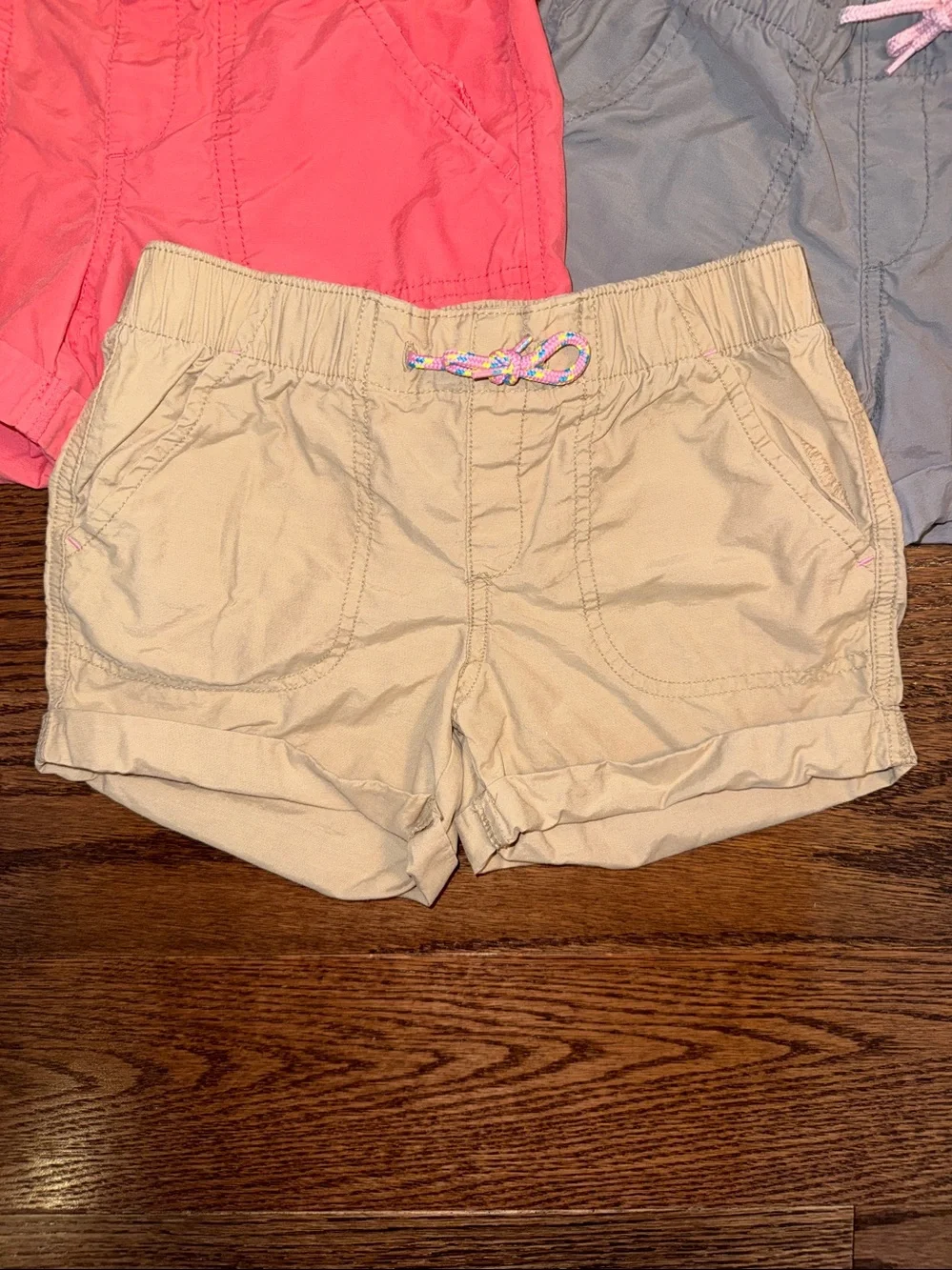 Size 8/M girls bundle of 3pull-on shorts from Old Navy. Pink, gray, khaki.